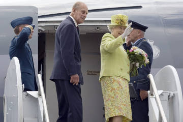 The Queen waves goodbye to Julie.